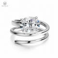 Jessica round moissanite spiral ring on a clean white background