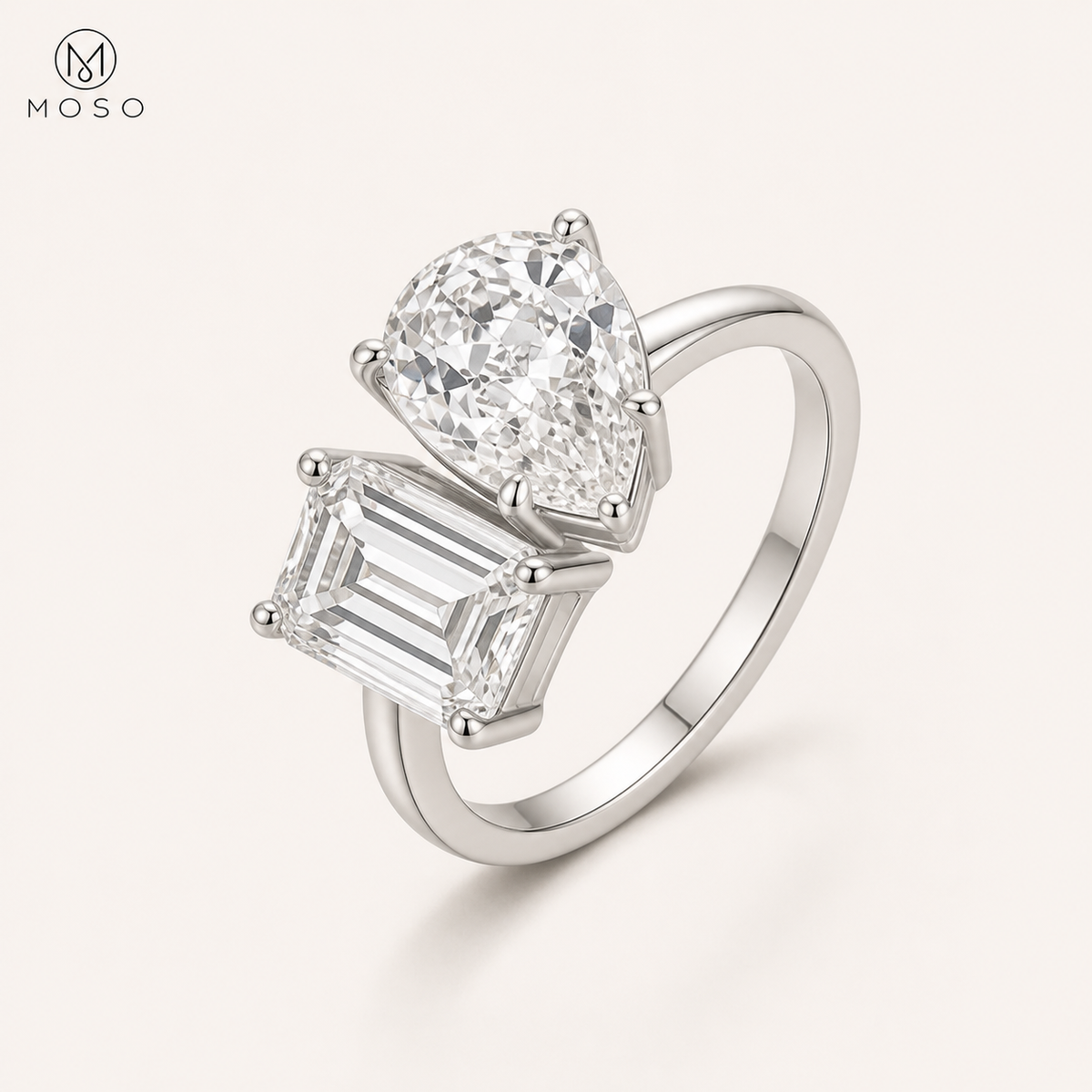 Kennedy 4ct pear and emerald cut Toi et Moi ring