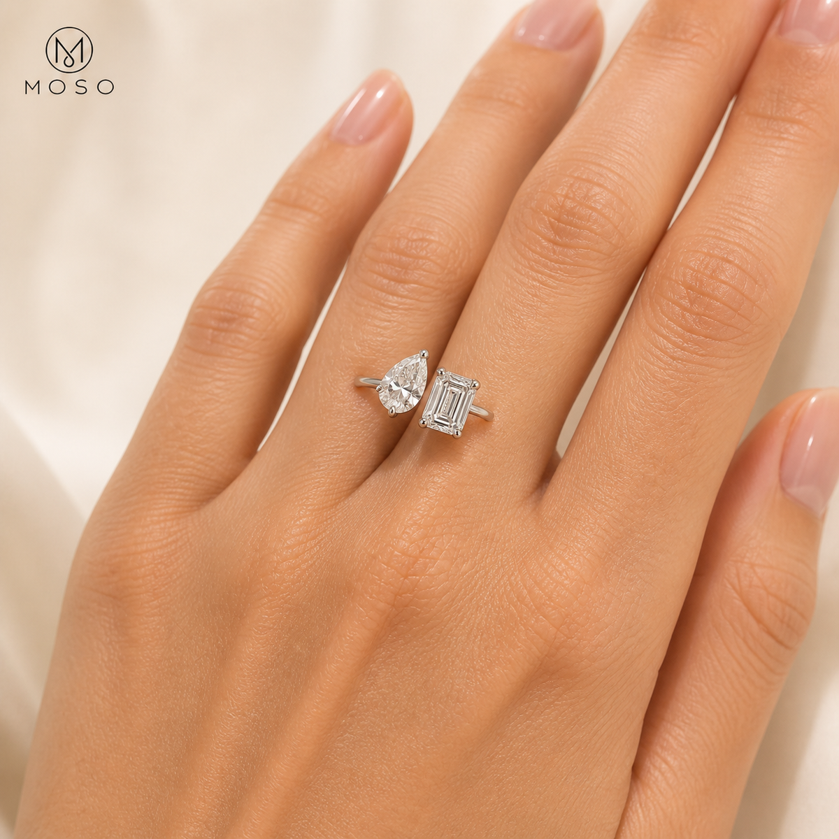 Kennedy pear and emerald moissanite ring worn on hand