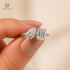 Kennedy Toi et Moi ring held between fingers
