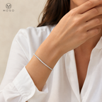 Lauren 3mm moissanite tennis bracelet worn on a woman's wrist