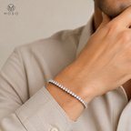 Lauren 5mm moissanite tennis bracelet worn on a man's wrist