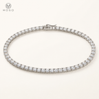 Layla clear round stone tennis necklace on ivory background