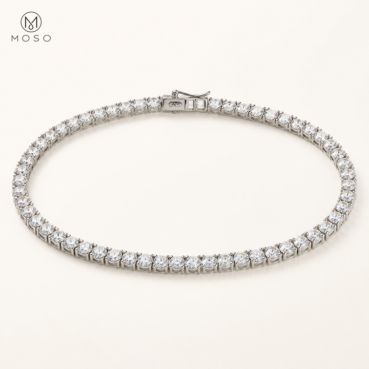 Layla clear round stone tennis necklace on ivory background