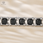 Five square cut black moissanite stones in silver four prong settings