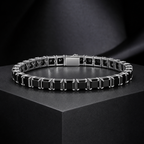Lucy black moissanite tennis bracelet on a charcoal pedestal