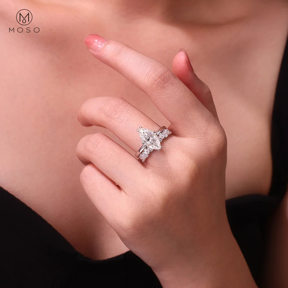 Woman wearing Madison marquise moissanite bridal set with MOSO logo