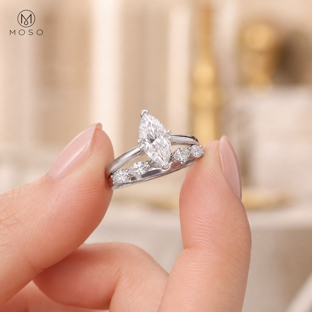 Madison marquise moissanite bridal set held in hand with MOSO logo