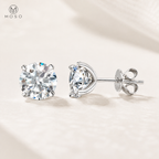 Mia round moissanite stud earrings in silver tone on a soft ivory background