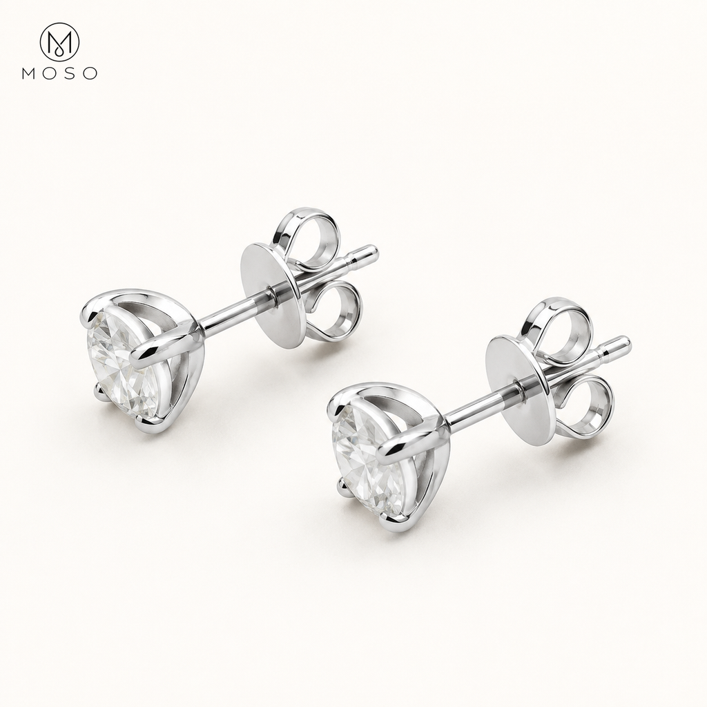 Mia round moissanite stud earrings showing the open basket, posts and butterfly backs