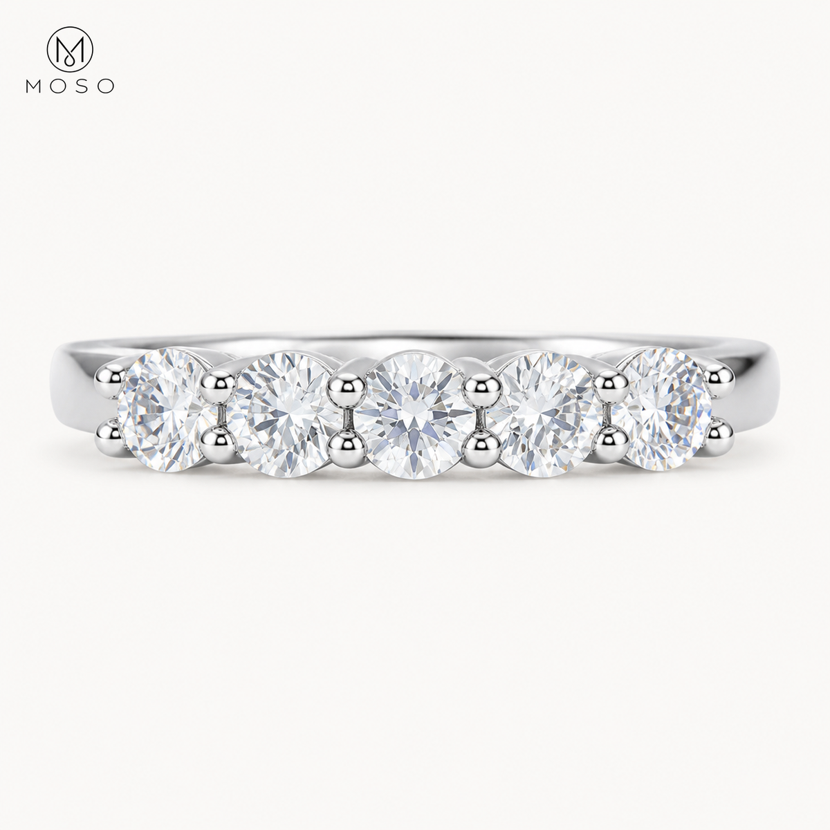 Natalie five stone round moissanite wedding band on white background