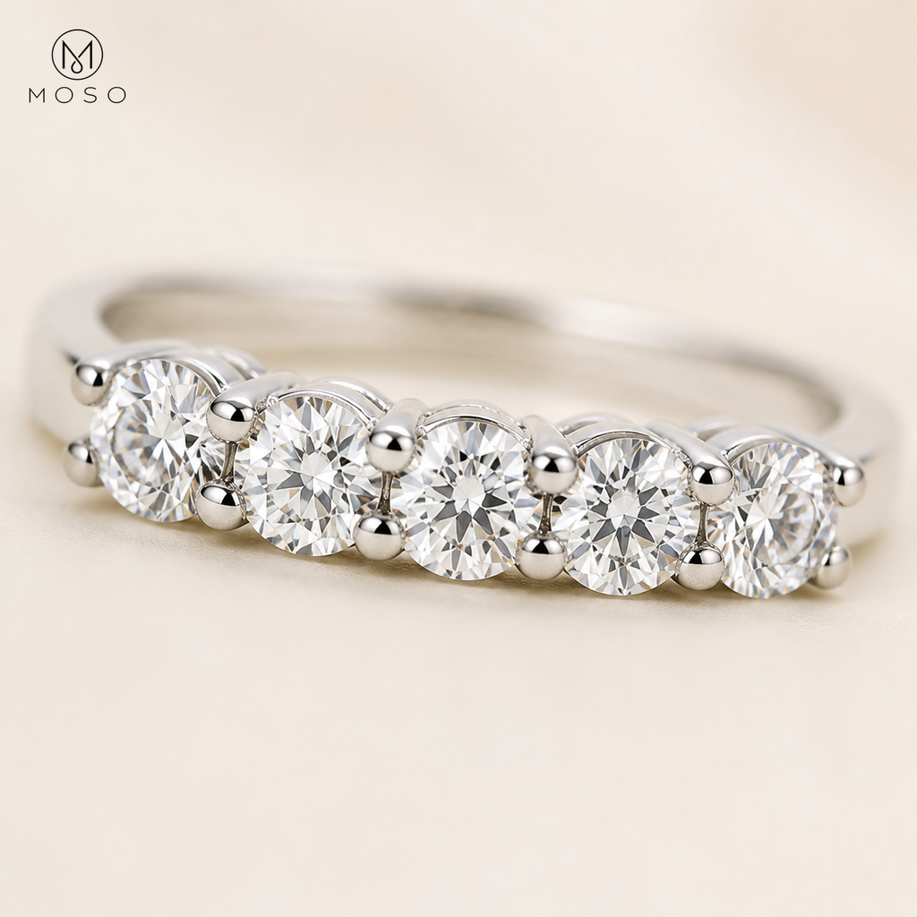 Natalie round moissanite stones and shared prongs close up