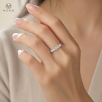 Natalie five stone moissanite wedding band worn on hand