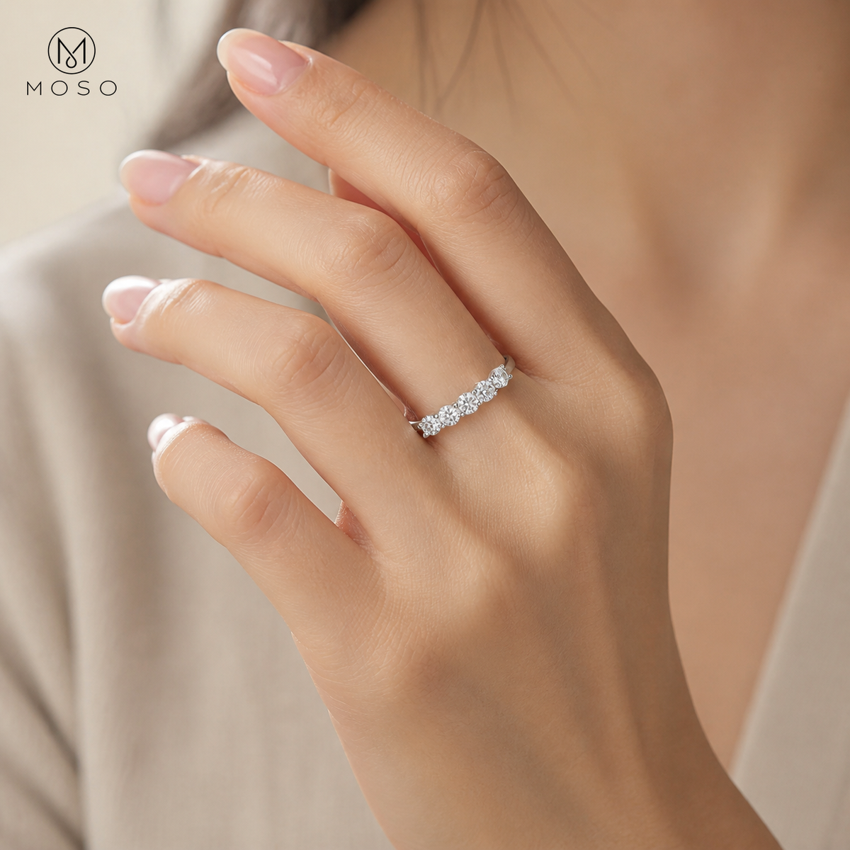 Natalie five stone moissanite wedding band worn on hand