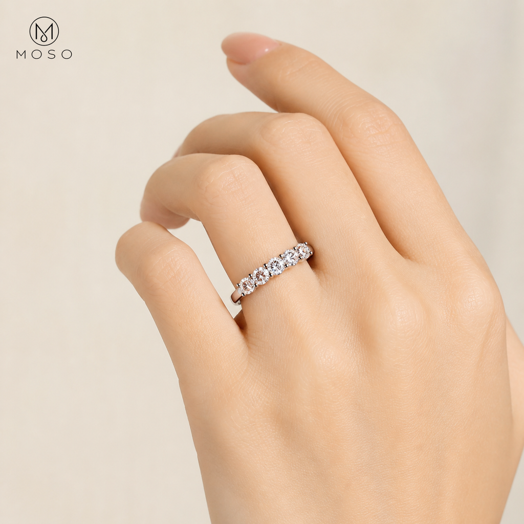 Natalie round moissanite ring side view on hand