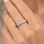Natalie five stone wedding band close view on hand