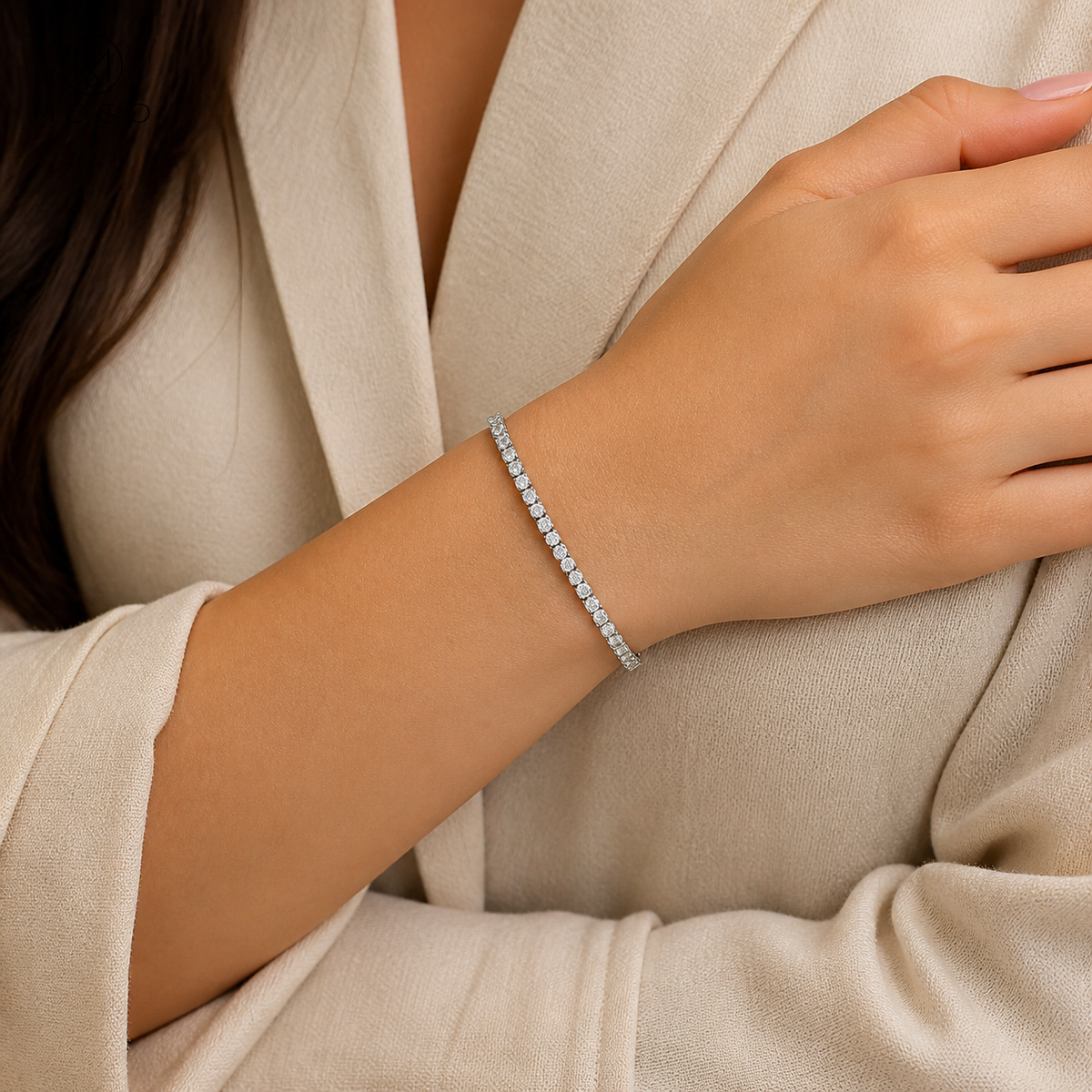 Woman wearing Nora silver tone moissanite tennis bracelet