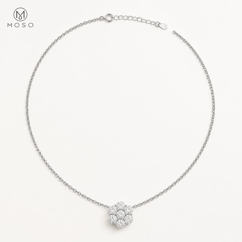 Penelope silver tone moissanite flower necklace on ivory background