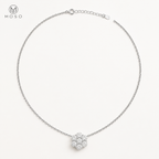 Penelope silver tone moissanite flower necklace on ivory background