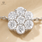Close view of Penelope seven stone moissanite flower pendant