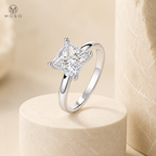 Riley princess cut moissanite solitaire ring on ivory pedestal