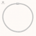 Sadie graduated moissanite tennis necklace three prong on ivory