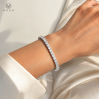 Samantha 4mm silver tone moissanite tennis bracelet worn on an adult wrist