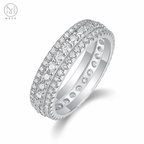 Scarlett three row round moissanite eternity ring in silver tone on white background