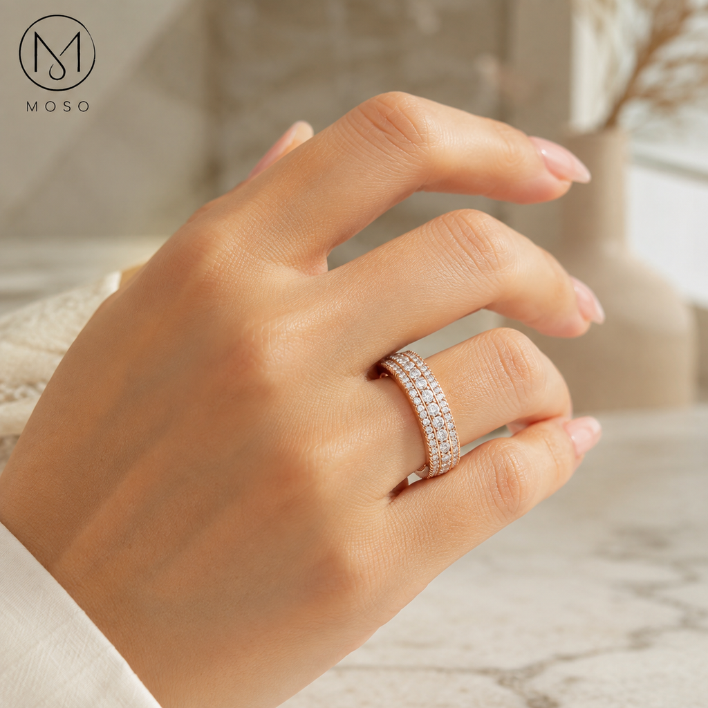 Scarlett rose gold tone moissanite eternity ring worn on hand