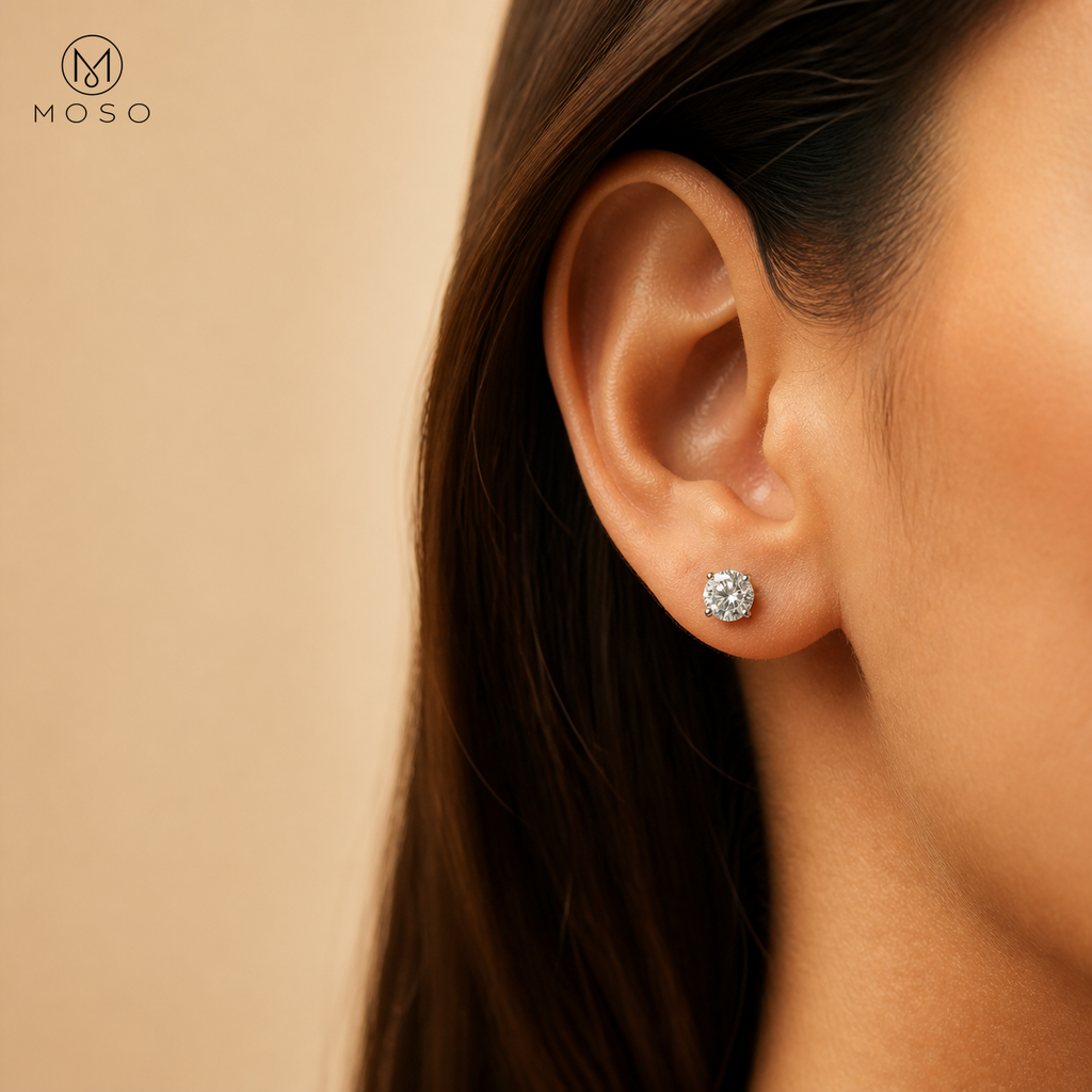 Sophia round moissanite stud earring worn on ear
