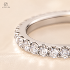 Taylor moissanite eternity ring shared prong setting detail