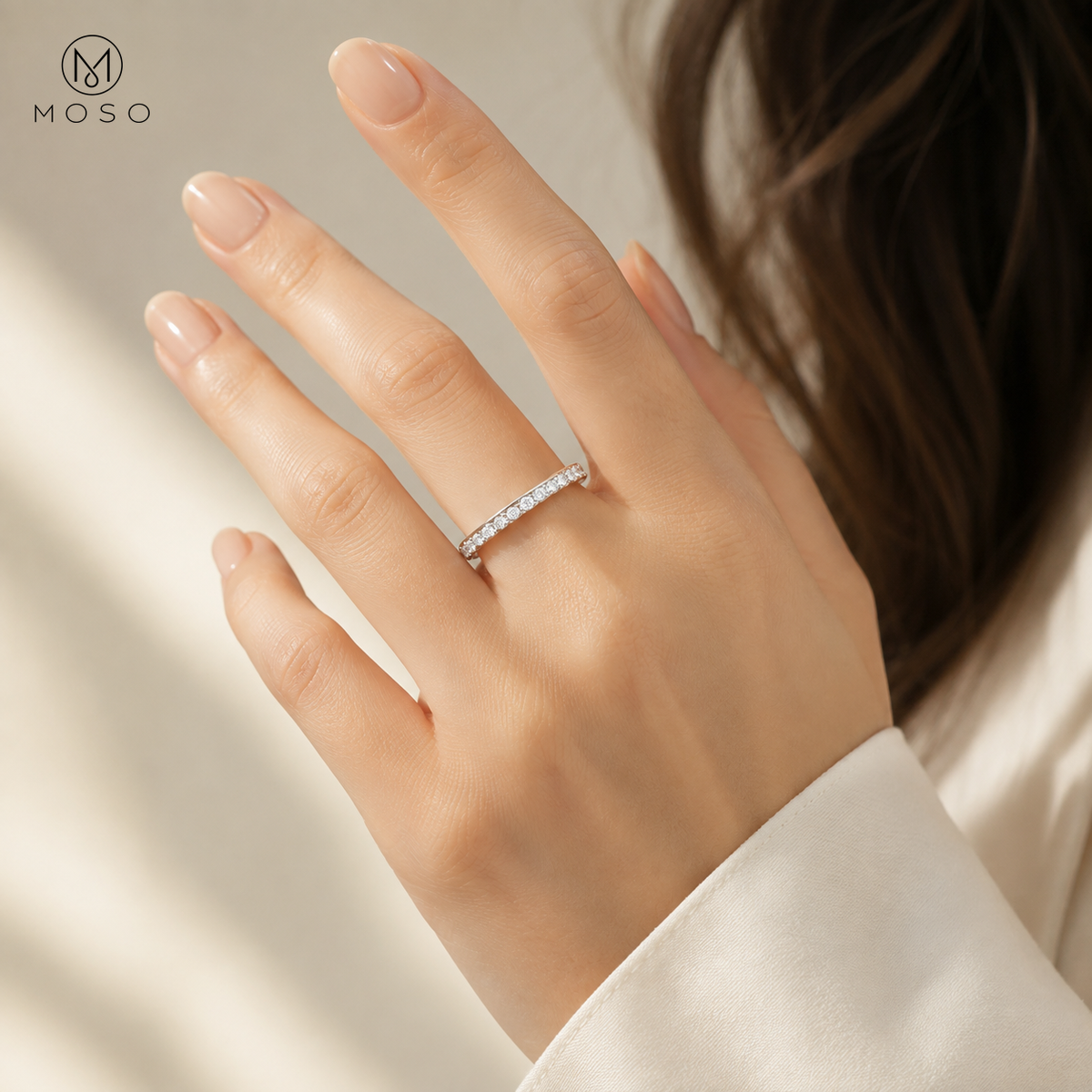Taylor silver tone moissanite eternity ring worn on hand