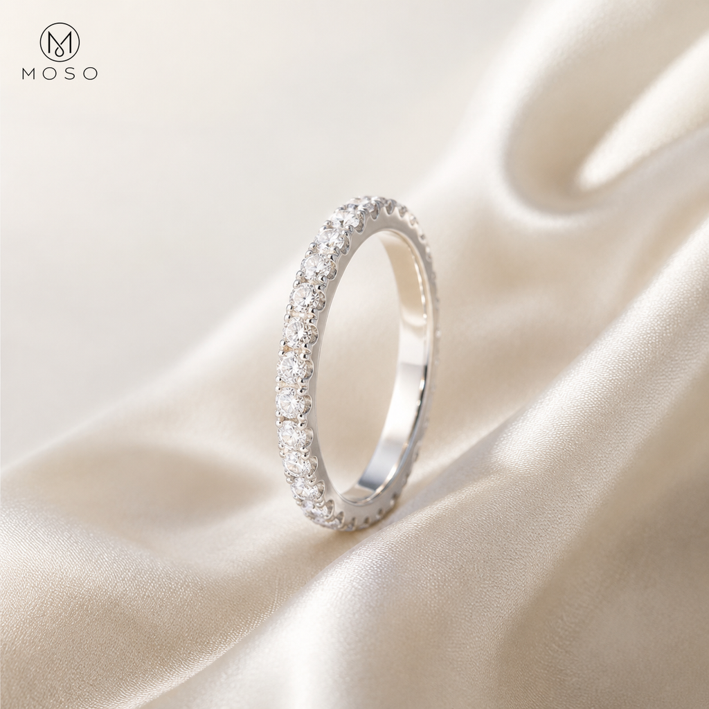 Taylor silver tone moissanite eternity ring on ivory silk