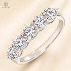 Zoe five round moissanite stones close up