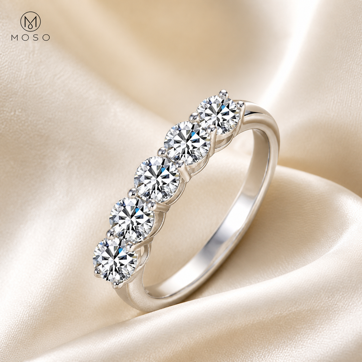 Zoe five stone moissanite band on ivory satin