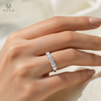 Zoe shared prong five stone ring side view on hand